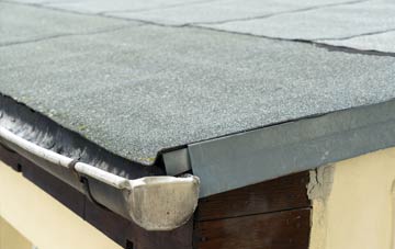 repair or replace Traps Green flat roofing?